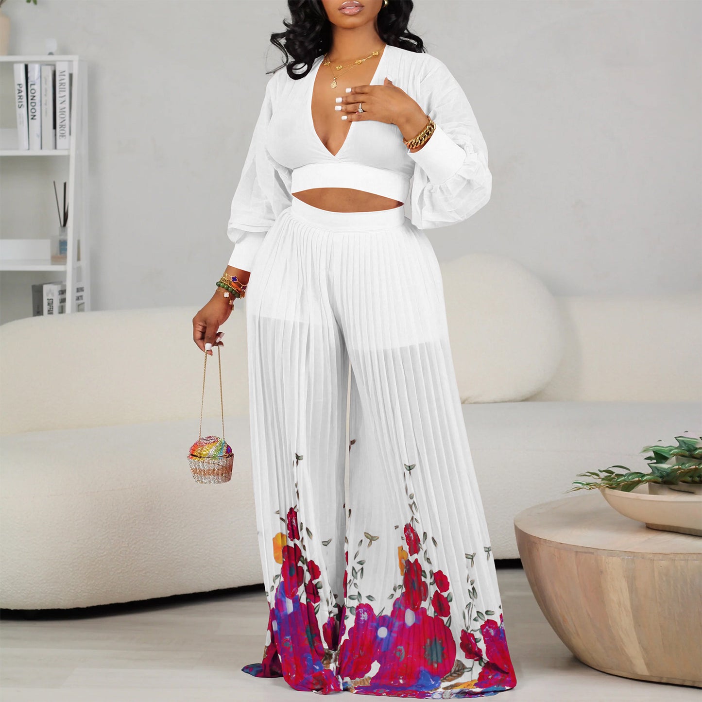 Dame let jumpsuit med elegante flæsekant og blomsterprint Stilla