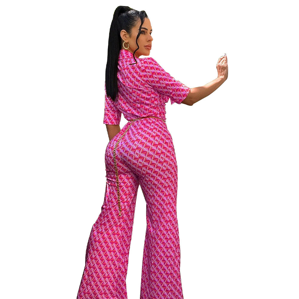 Dame jumpsuit med geometrisk design og smart taljebælte Stilla
