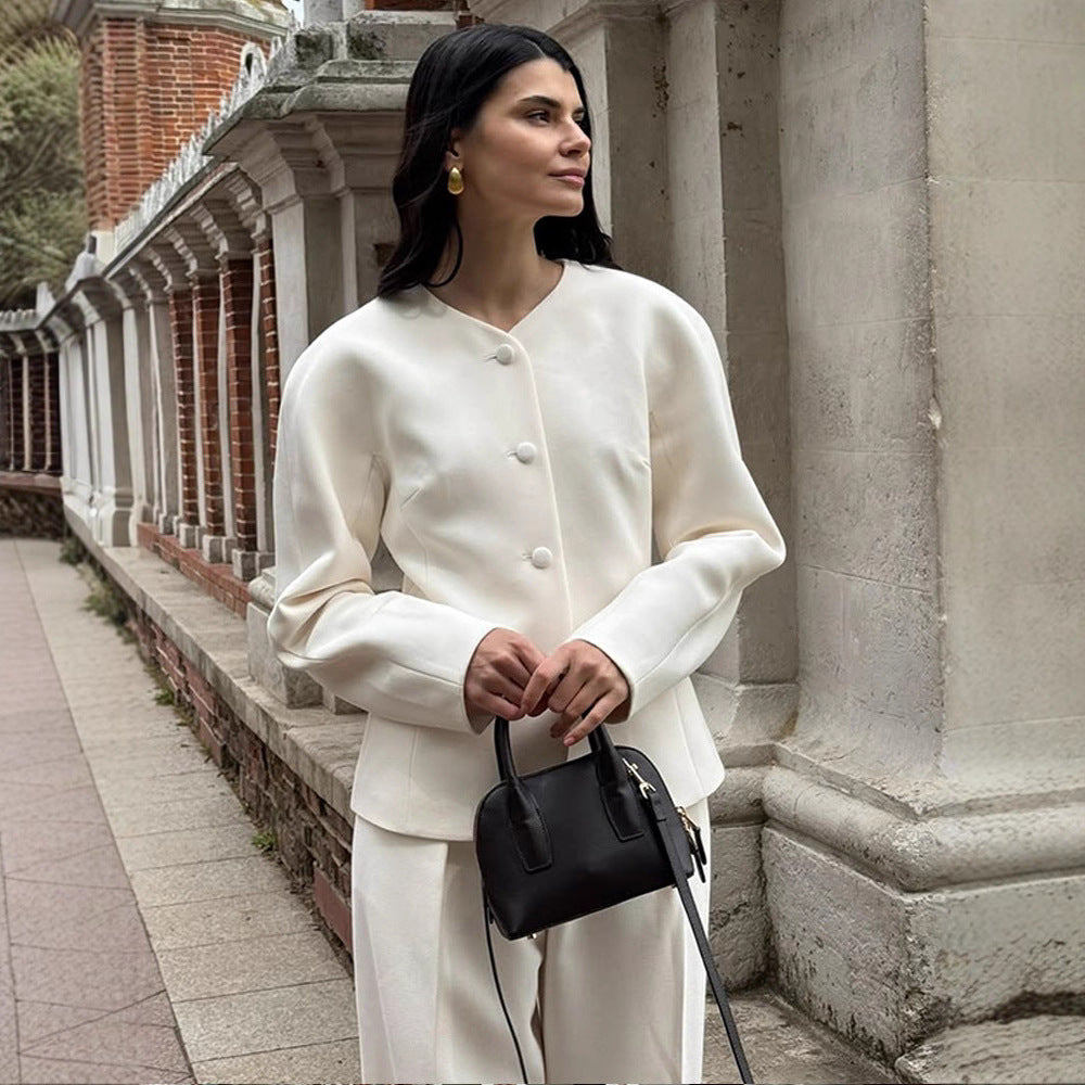 Dame Elegant Blazerjakke med fashionable Puffærmer og dekorativt Knapdesign Stilla