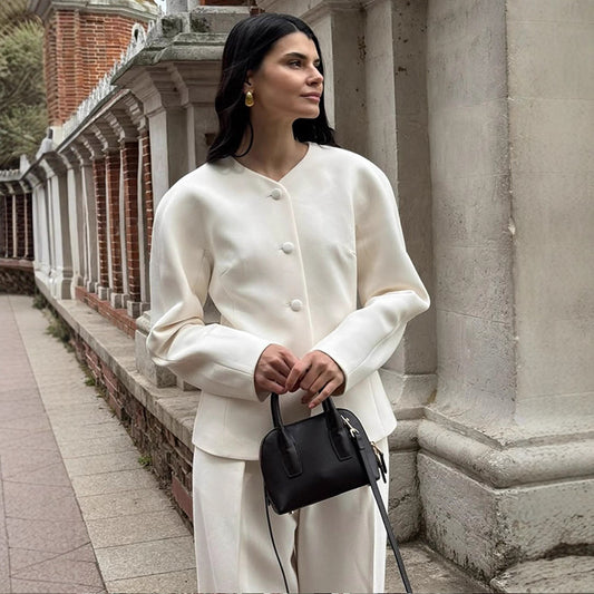 Dame Elegant Blazerjakke med fashionable Puffærmer og dekorativt Knapdesign Stilla