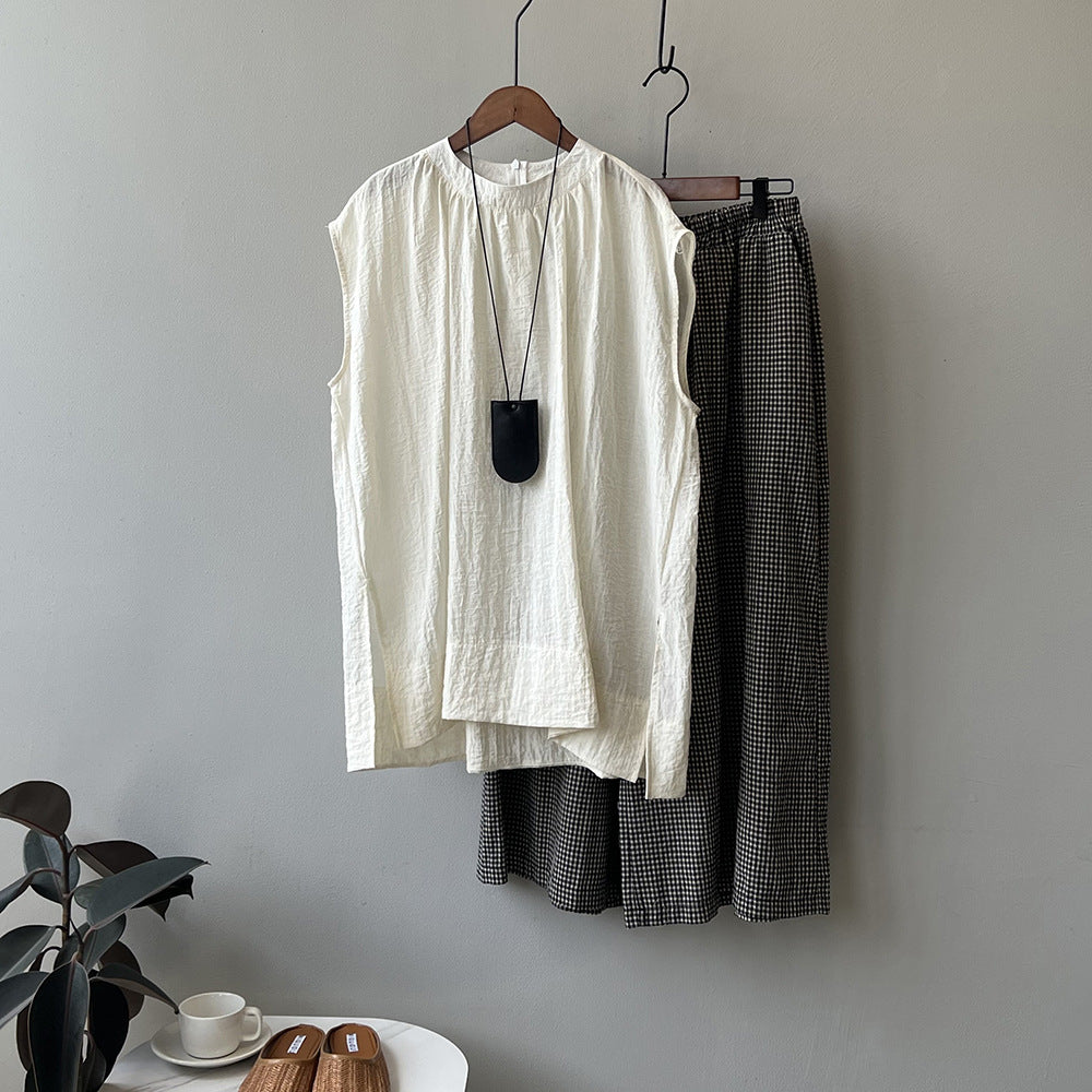 Dame afslappet langærmet top med fin plisseret lukning og V-hals Stilla