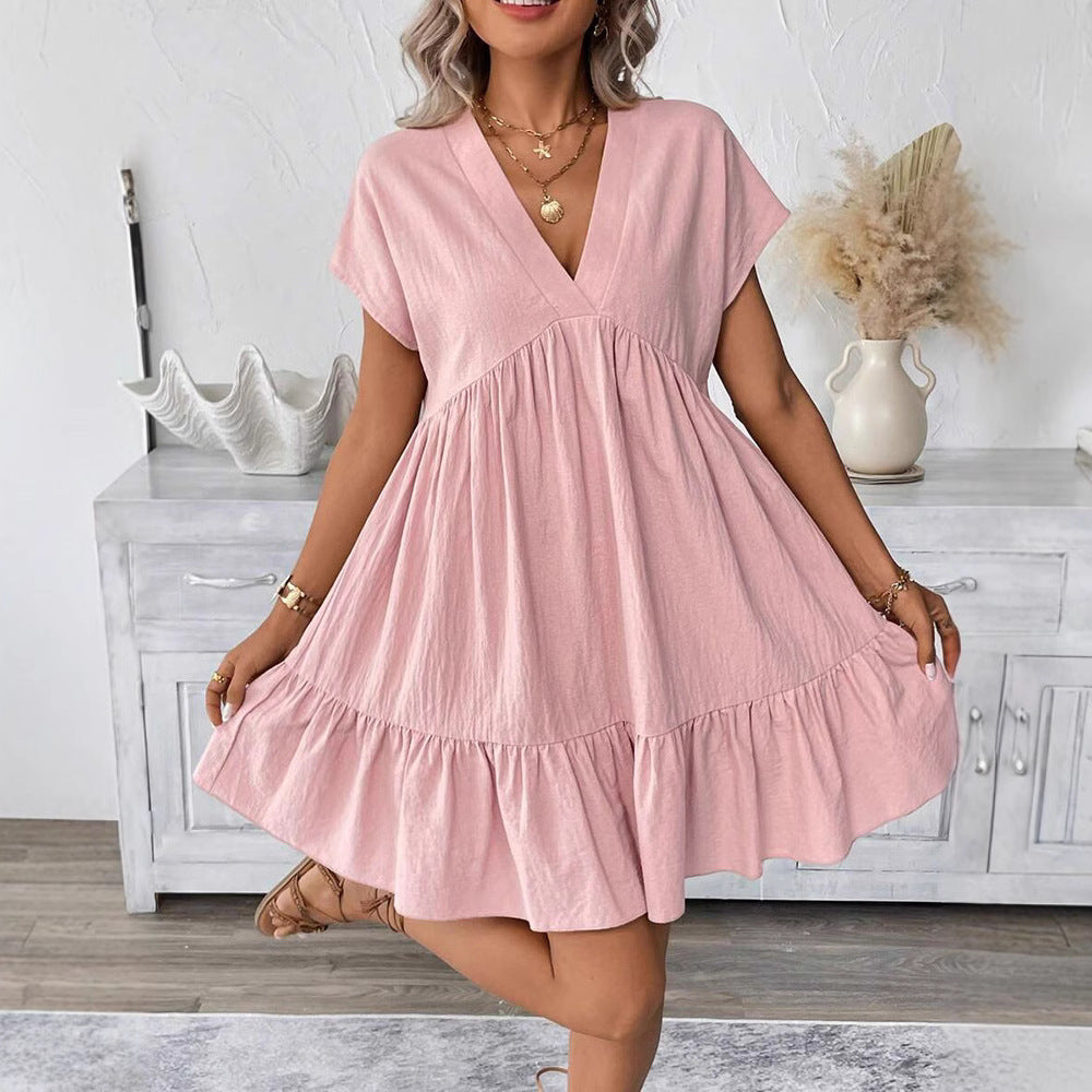 Dame afslappet sommerkjole med V-udskæring og voluminøs bund Stilla