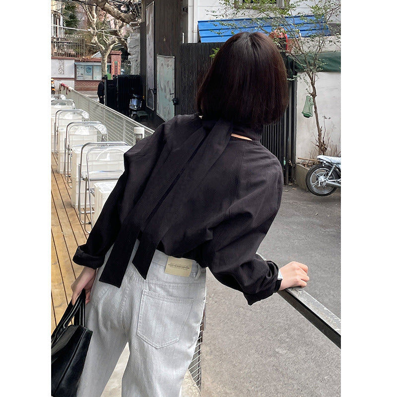 Dame afslappet langærmet skjorte med knapbare detaljer og fin struktur Stilla