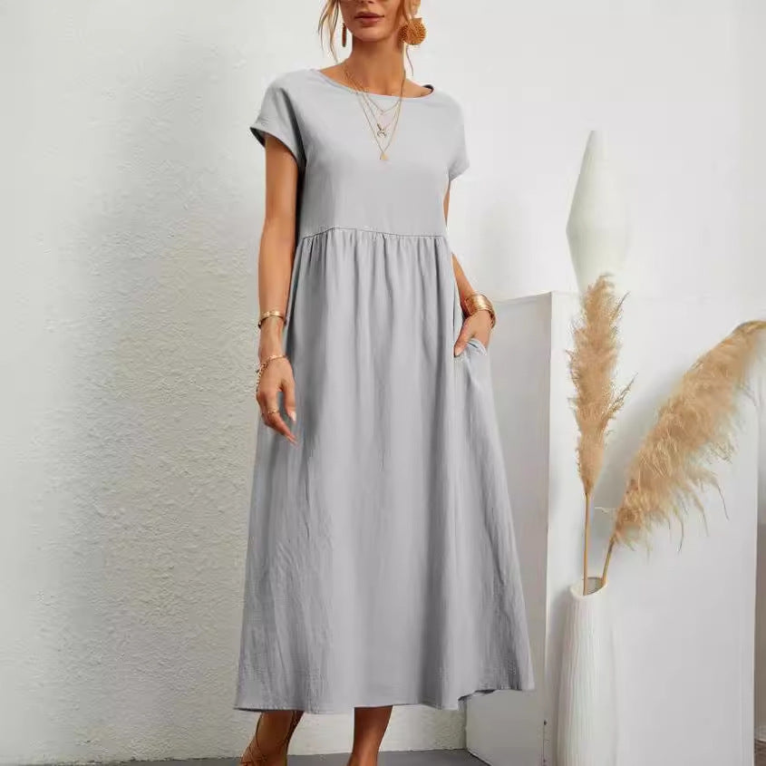 Dame afslappet midikjole med elegant snit og praktiske lommer Stilla