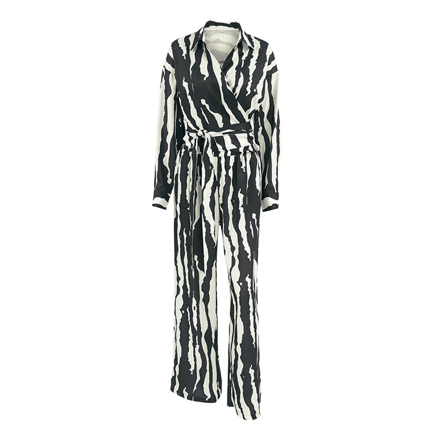 Dame jumpsuit med eksklusivt zebra-mønster og figursyet design Stilla