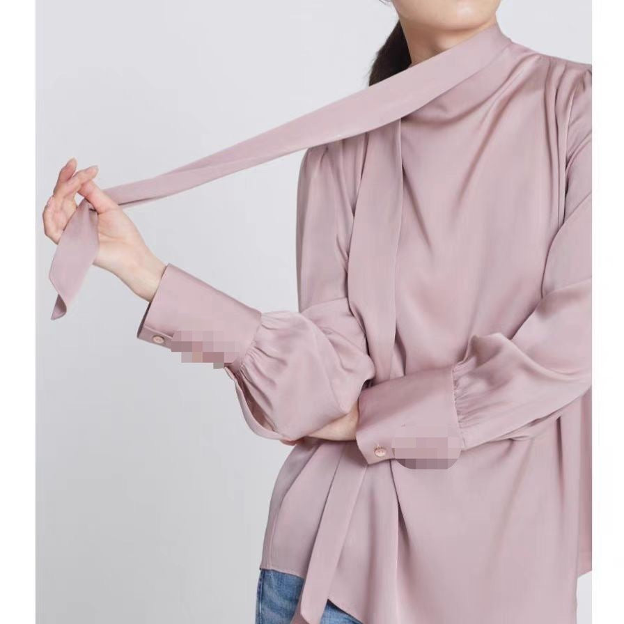 Dame elegant bluse med moderigtig bånd og voluminøse ærmer Stilla