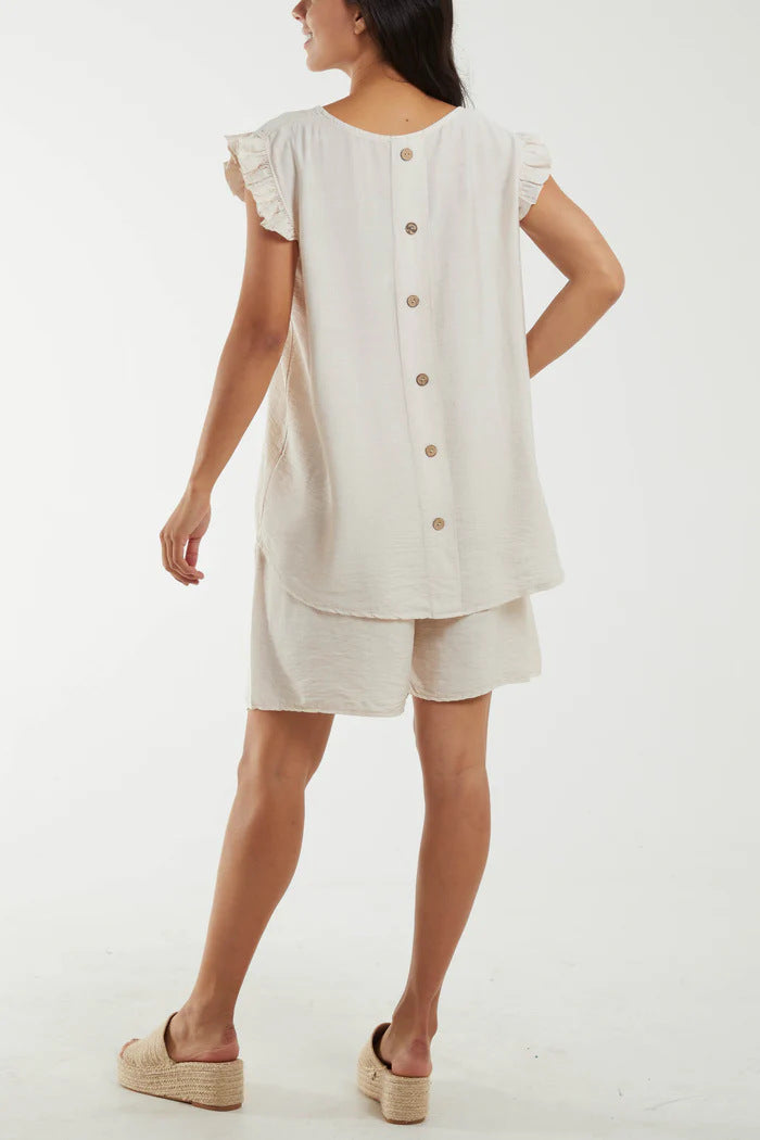 Dame afslappet kortærmet sæt med flæsedetaljer og praktiske lommer Stilla