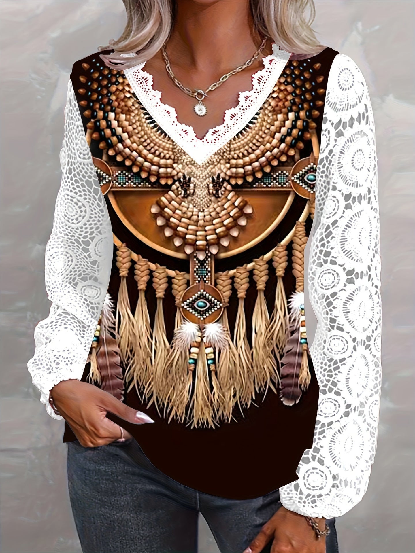 Dame afslappet overdel med detaljeret etno-mønster og spidse ærmer Stilla