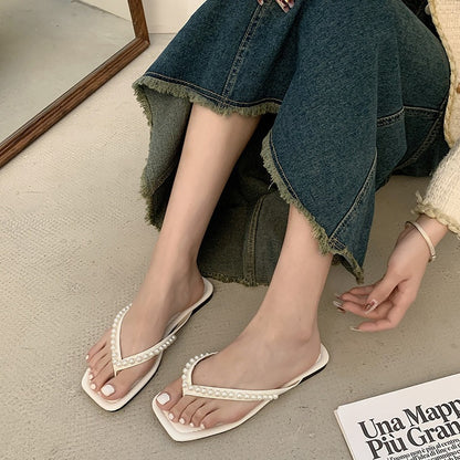 Dame badetøj med elegante perle-detaljer og skridsikker sål Stilla