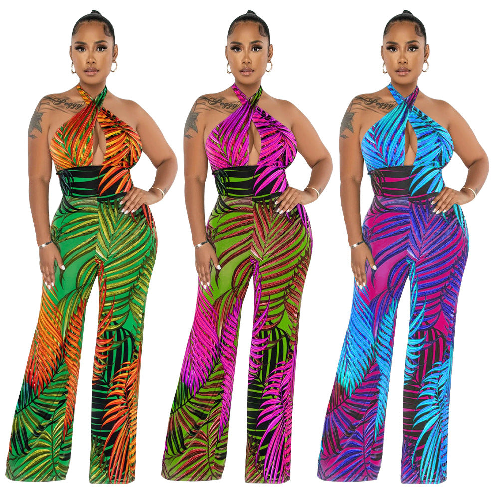 Dame elegant jumpsuit med afslappet halter-design og iøjnefaldende bladmønster Stilla