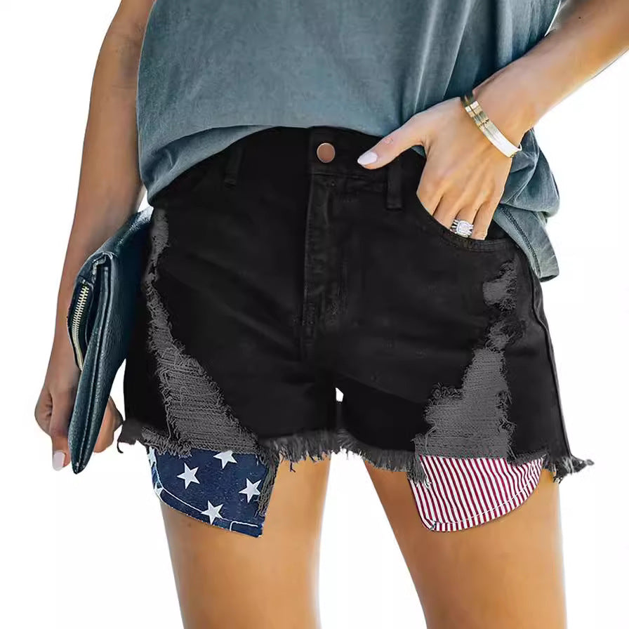 Dame afslappede Denim-shorts med moderigtige ripped-detaljer og Amerika-flags-elementer Stilla
