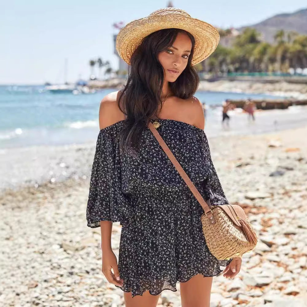 Dame Offshoulder jumpsuit med flæsedetaljer og elastisk talje Stilla
