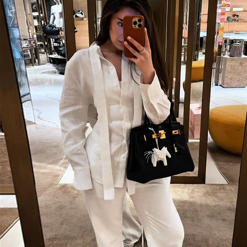 Dame Elegant Bluse med lange ærmer og stilfuldt bånd Stilla