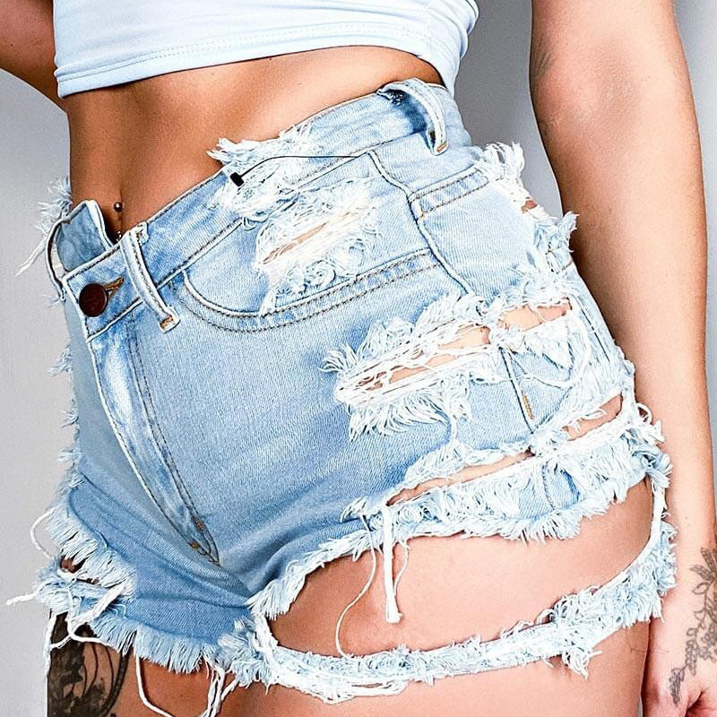 Dame Destroyed Denim Shorts med trendy frynse look Stilla