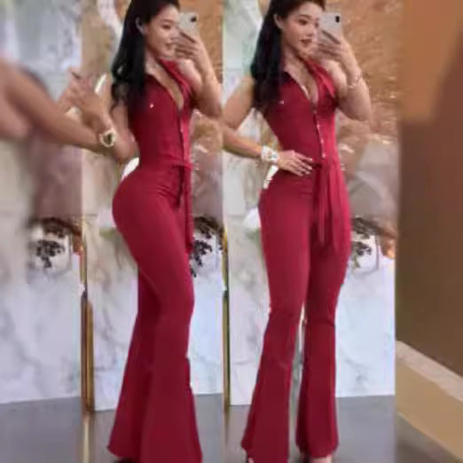 Dame elegant flared jumpsuit med knapliste og taljeret silhuet Stilla