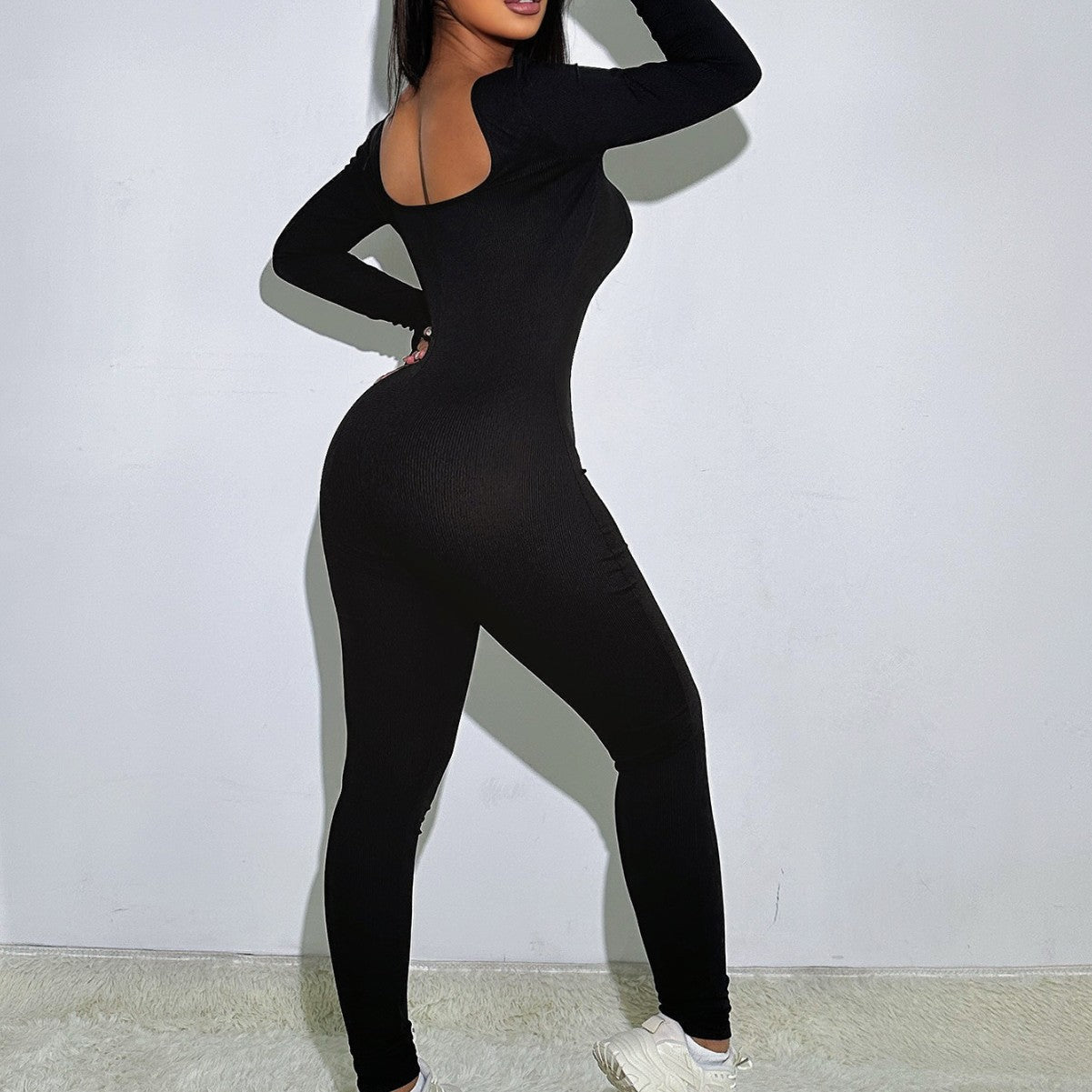 Dame Jumpsuit med figurformende design og moderne ærmelukninger Stilla
