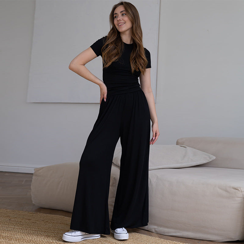 Dame elegant jumpsuit med figursyet overdel og vidde ben Stilla