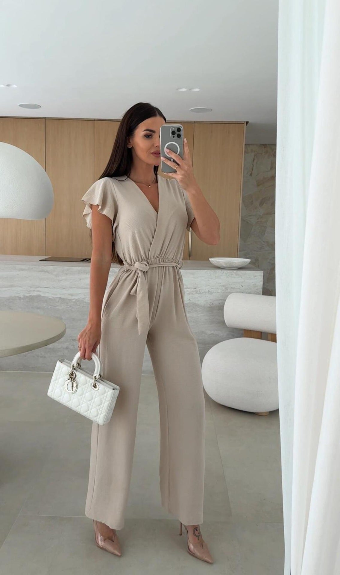 Dame elegant jumpsuit med indviklet udseende og flæseærmer Stilla