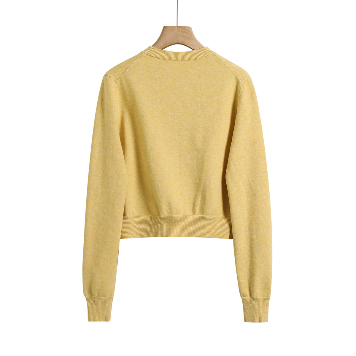 Dame Cropped Strikjakke med elegant knaplukning og blødt materiale Stilla