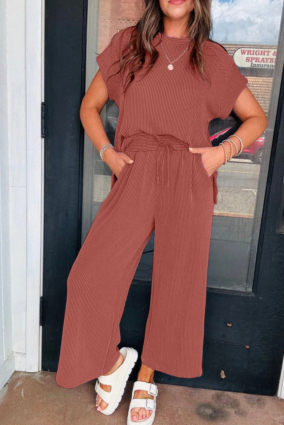 Dame afslappet strik-jumpsuit med brede ben og elastisk talje Stilla