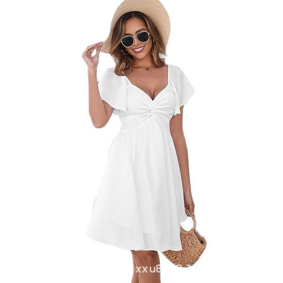 Dame afslappet sommerkjole med flydende snit og vikledetalje Stilla