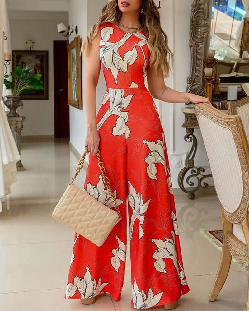 Dame jumpsuit med floral design og bred ben Stilla