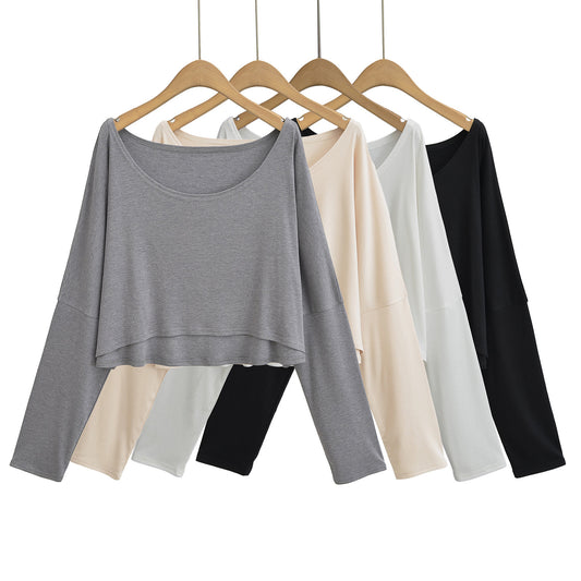 Dame afslappet langærmet crop-top med bred silhuet og elegant rund halsudskæring Stilla