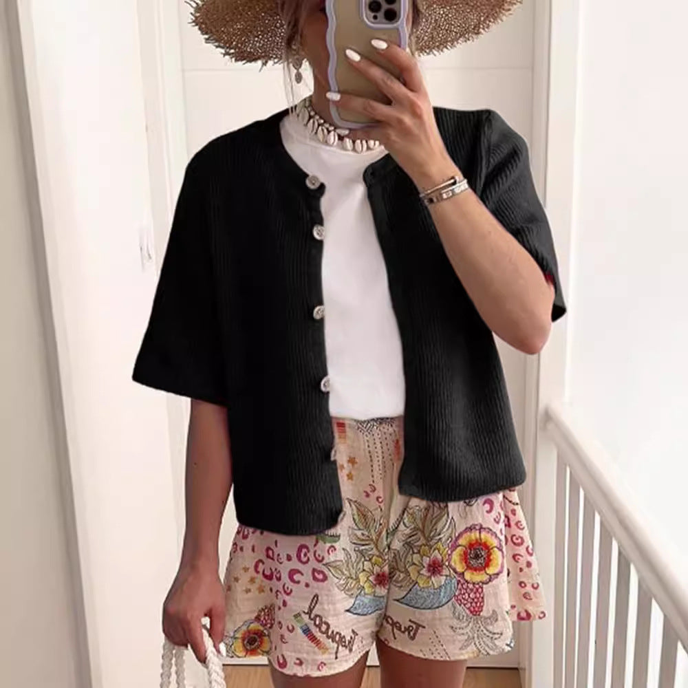 Dame åben strikjakke med elegante knapdetaljer Stilla