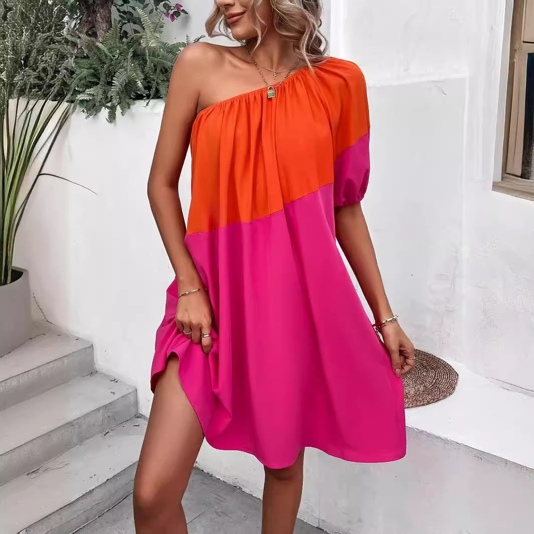 Dame afslappet asymmetrisk sommerkjole med en-sidig stropp og farverigt blokdesign Stilla