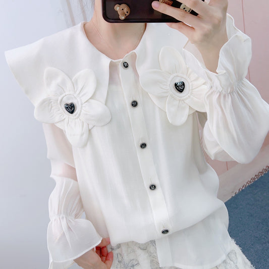 Dame elegant bluse med blomsterapplikationer og puffærmer Stilla