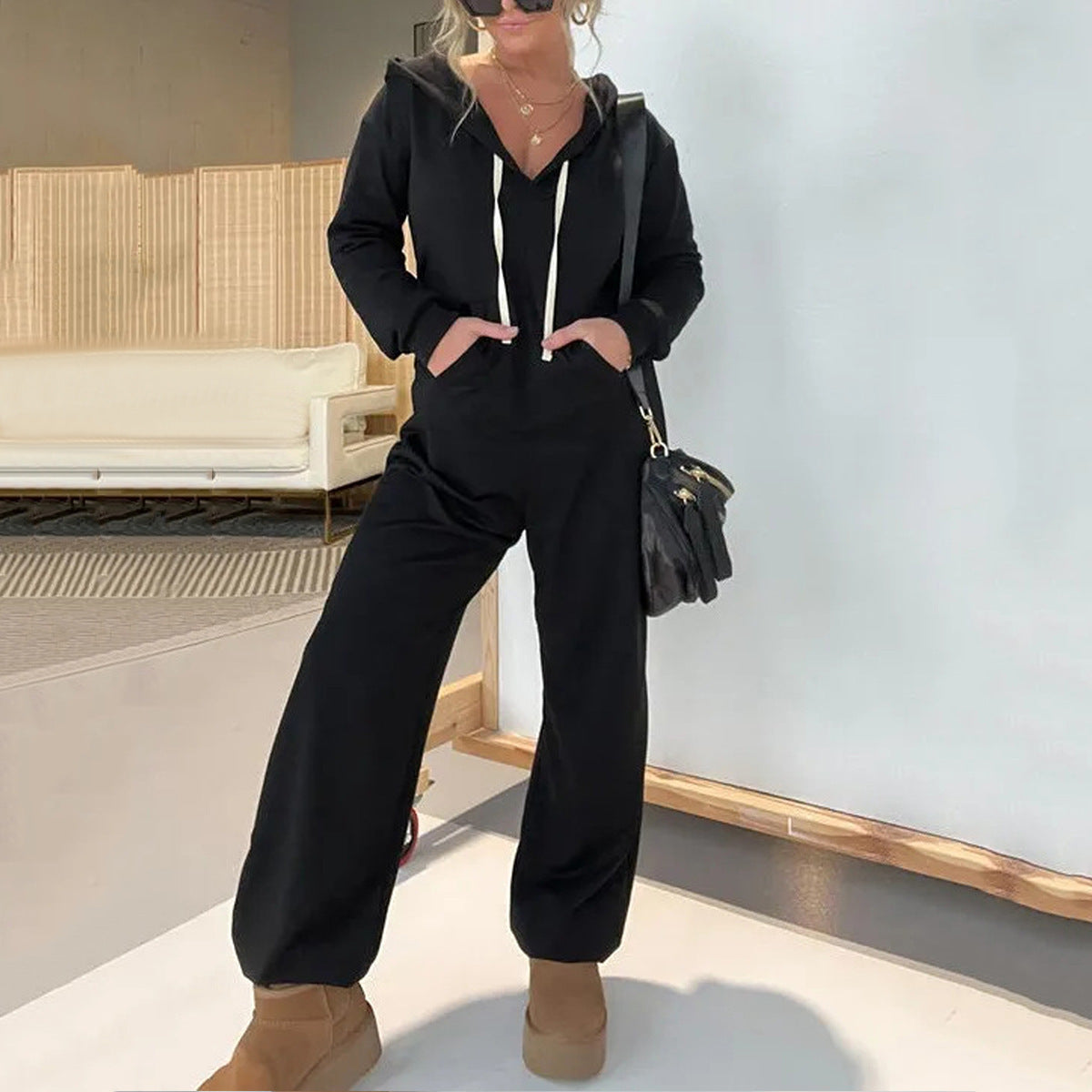 Dame Sporty Jumpsuit med Hætte og praktiske Lommer Stilla