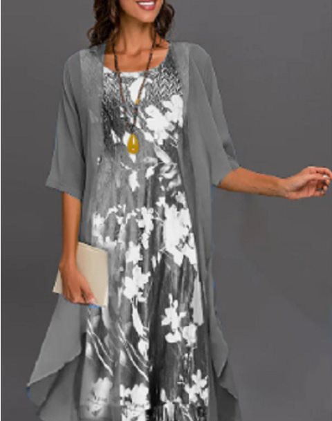 Dame elegant fritidskjole med asymmetrisk kant og floral design Stilla