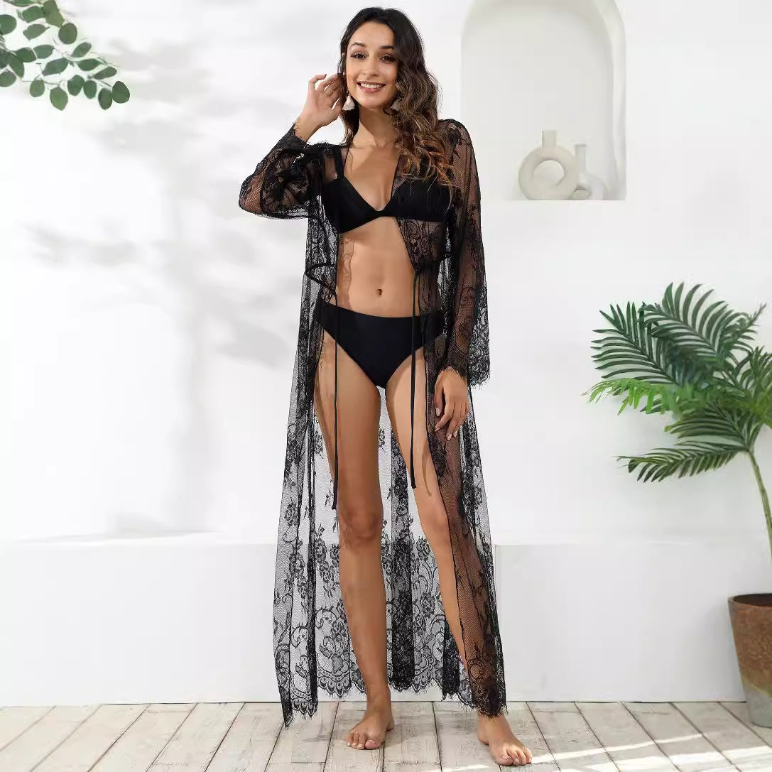 Dame elegant blonde strandoverdel med blomstermønster og luftige ærmer Stilla