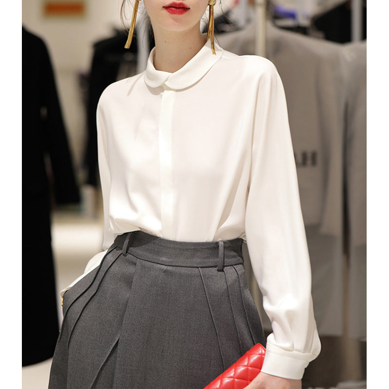 Dame elegant bluse med klassisk bubikræft og fin stofstruktur Stilla