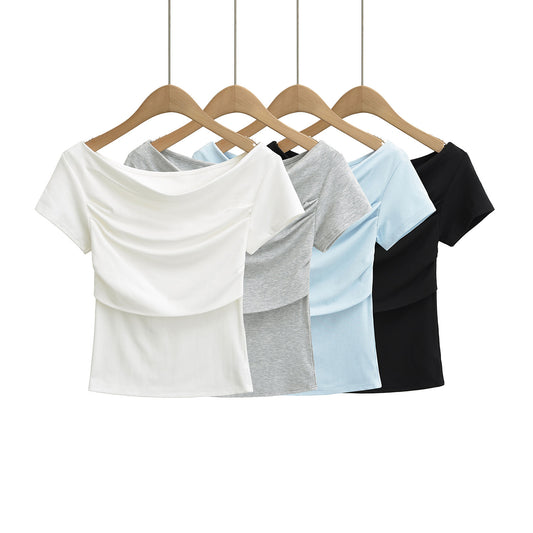 Dame afslappet crop-top med elegant off-shoulder-design og raffineret drapering Stilla