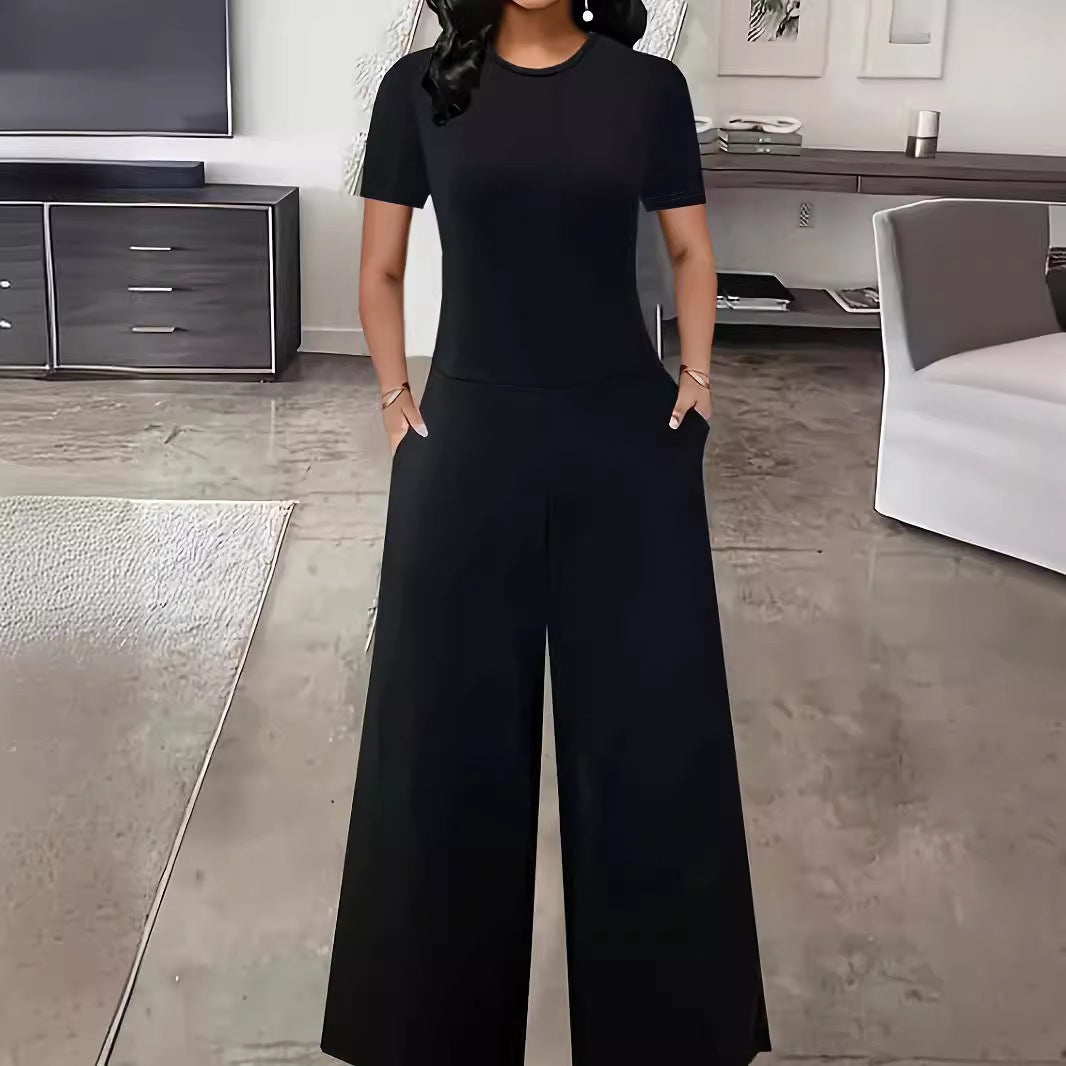 Dame Elegant Jumpsuit med bredt ben og moderigtig rund halsudskæring Stilla