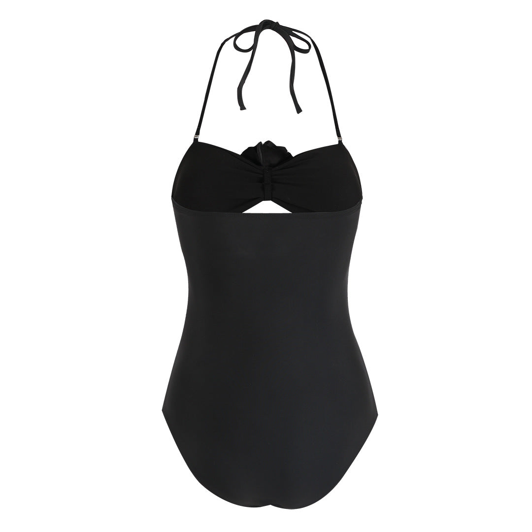 Dame Elegant Én-delt Badedragt med blomsteraccent og smart Cut-Out Design Stilla