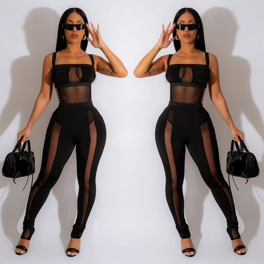 Dame figursyet jumpsuit med mesh-indsatser og høj talje Stilla