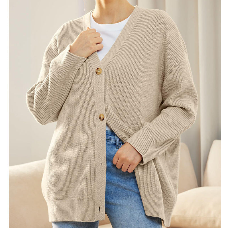 Dame strikjakke med oversized snit og knapdetaljer Stilla