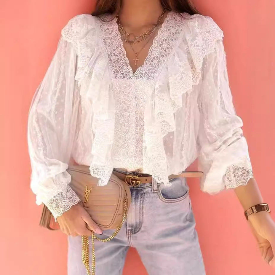 Dame elegant bluse med spetskant og flæsedetaljer Stilla