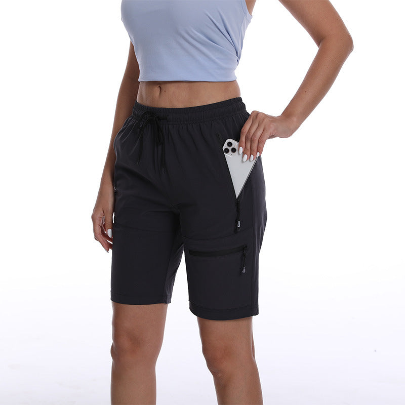 Dame Sporty shorts med praktiske lynlåslommer og justerbar talje Stilla
