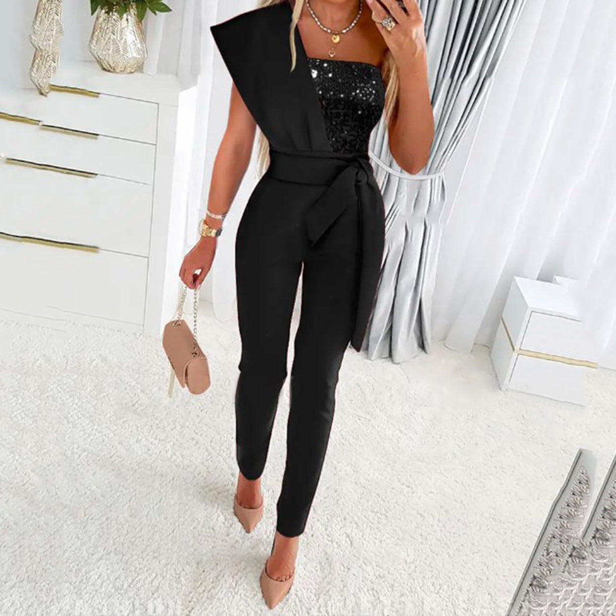 Dame elegant jumpsuit med asymmetrisk snit og glitrende overdel Stilla