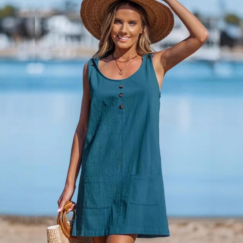 Dame afslappet strandkjole med praktiske lommer og knapdetaljer Stilla