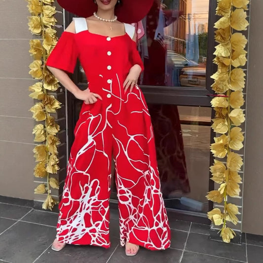 Dame jumpsuit med elegant snit og kreativt grafisk mønster Stilla