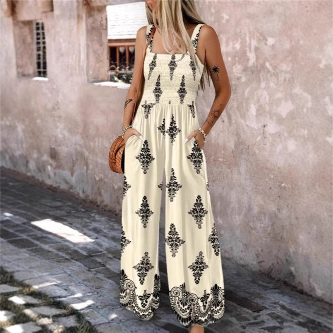 Dame luftig jumpsuit med blomstermønster og praktiske lommer Stilla