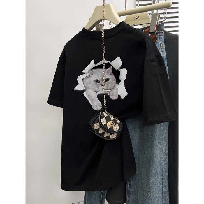 Dame T-shirt med kreativt kattemotiv gennem gennemboret væg Stilla