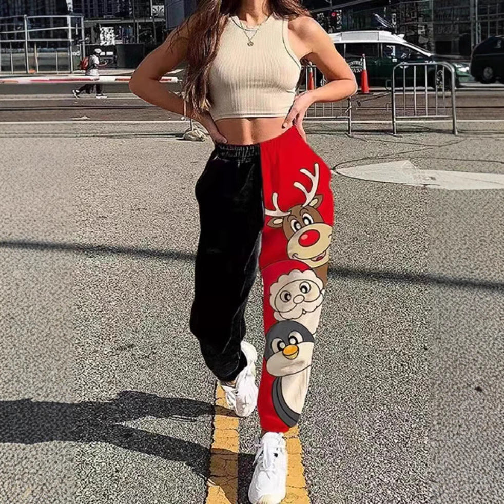 Dame afslappede fritidsbukser med festligt snemandsdesign og ternet mønster Stiila