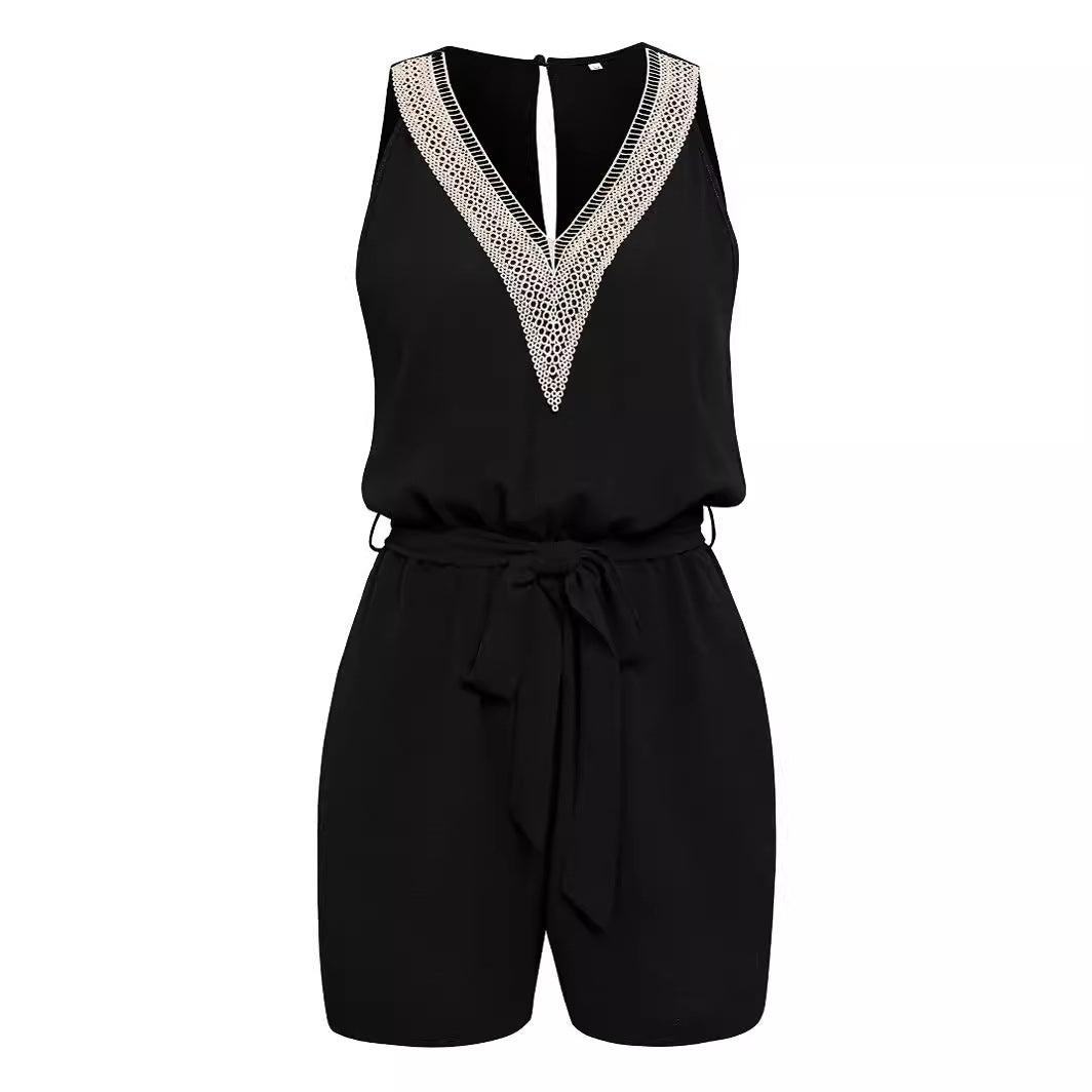 Dame jumpsuit med spidse detaljer og talje knude Stilla