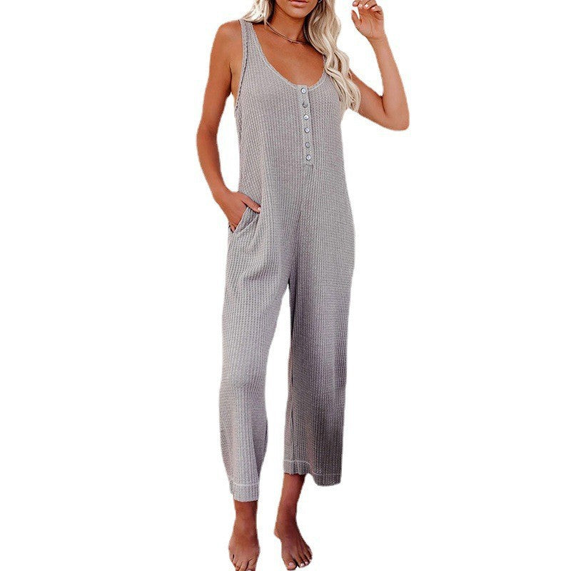 Dame jumpsuit med knaplukning og lommer Stilla