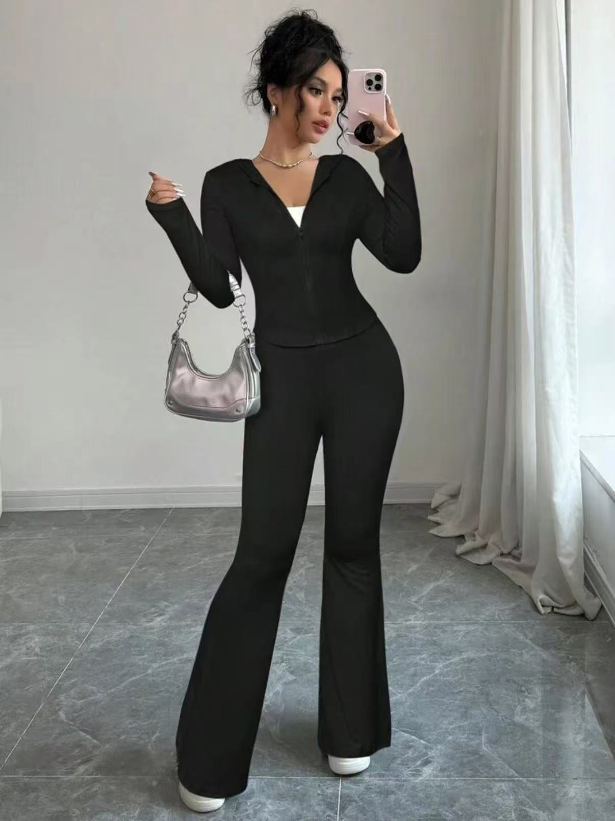 Dame Sporty Jumpsuit i elastisk materiale med lynlås Stilla